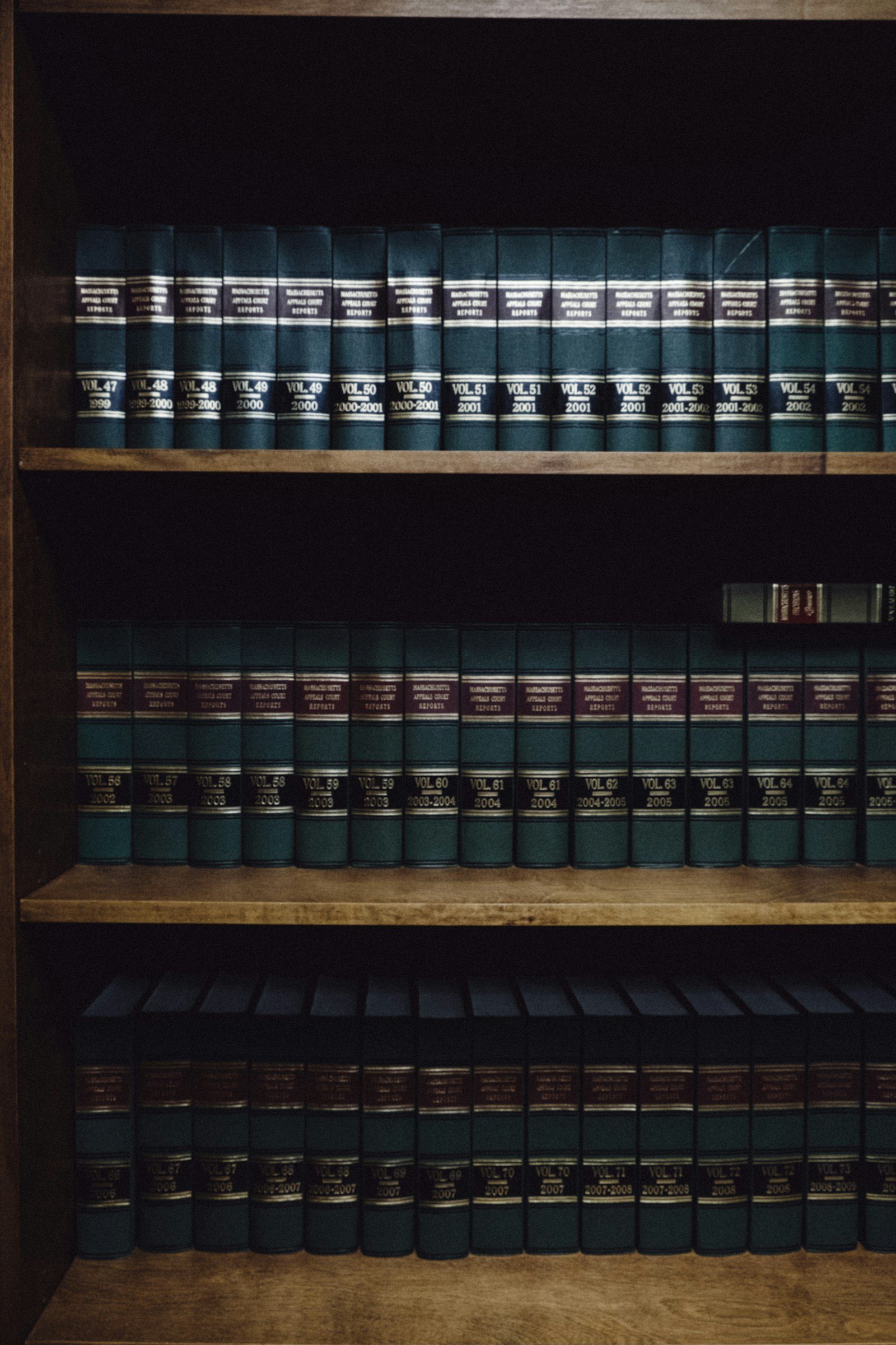 Open law books on a wooden desk representing CLAT counselling decision documents