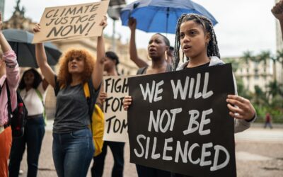 Climate justice protesters with banners