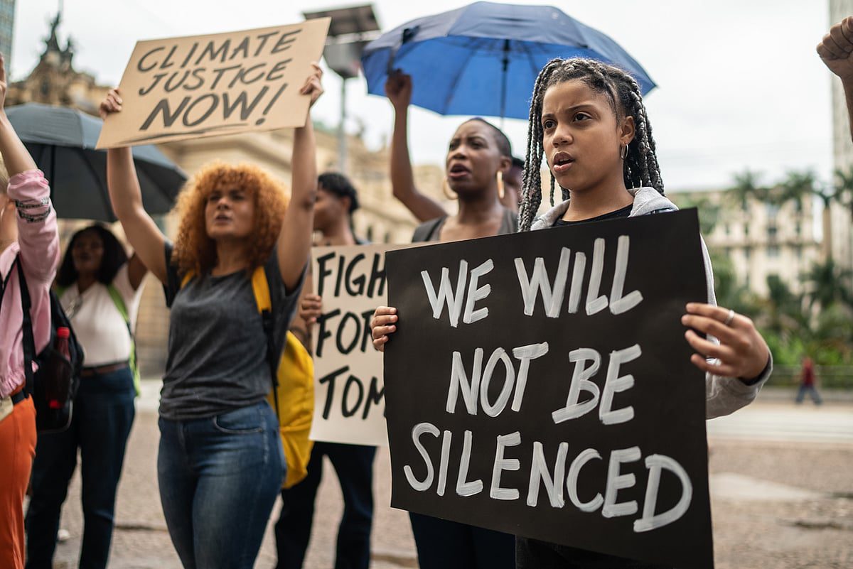Climate justice protesters with banners
