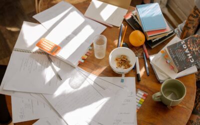 Student reviewing mock test paper at study desk