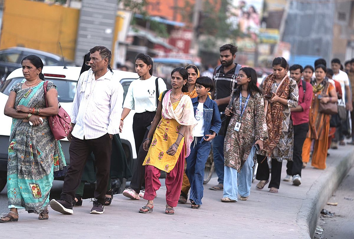 Rural workers in India holding placards demanding employment