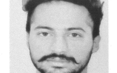 Symbolic representation of cross-border narco-terror suspect produced before authorities post-extradition
