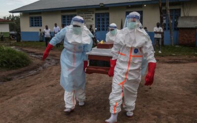 Ebola response health workers in protective equipment in DRC