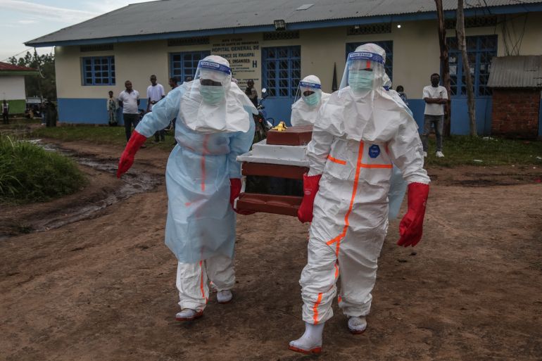 Ebola response health workers in protective equipment in DRC
