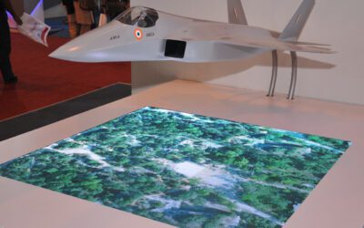 Scale model of India's Advanced Medium Combat Aircraft on display at an aerospace exhibition