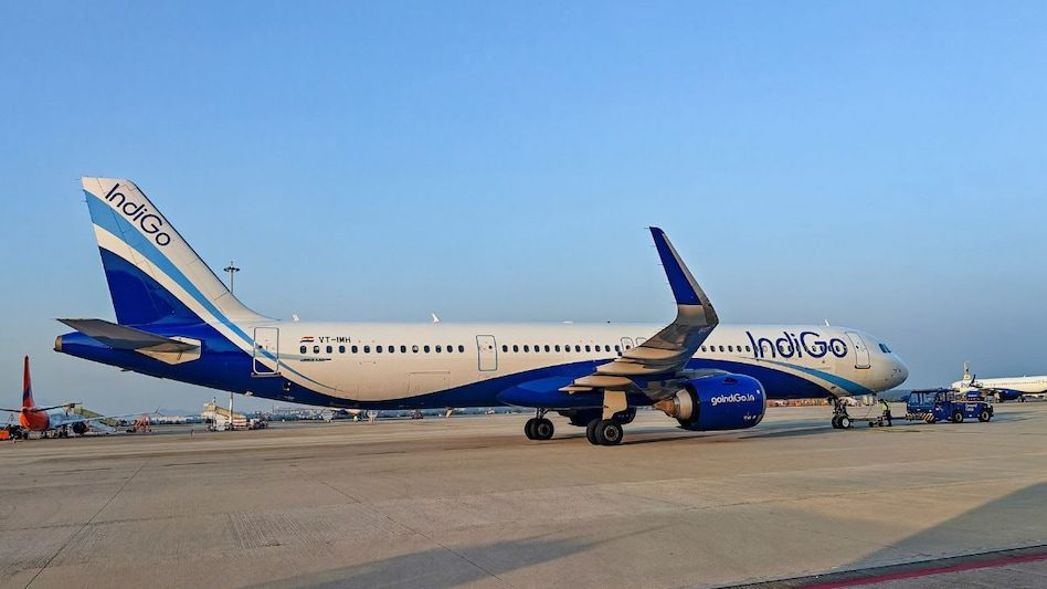 Commercial passenger jet on final approach to landing at an Indian airport