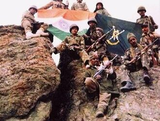 Indian Army soldiers on a captured mountain ridge during the Kargil conflict