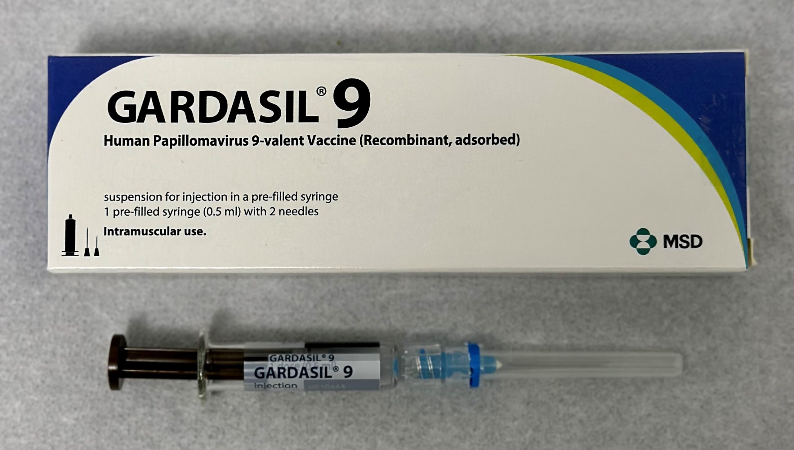 An HPV vaccine syringe and packaging used to prevent cervical cancer