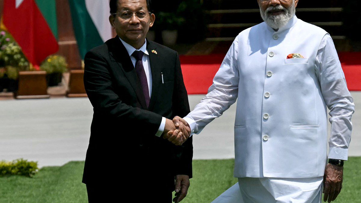 Indian PM and Myanmar president shake hands during state visit