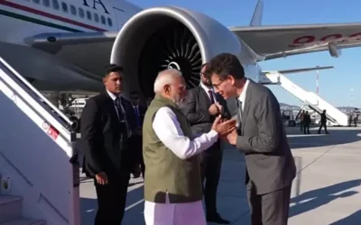 Indian and French leaders shaking hands ahead of a bilateral summit in France