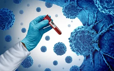 Researchers working in a biotechnology laboratory developing cell-based cancer therapy