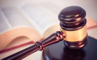 Law book and gavel representing CLAT 2027 notification and exam preparation