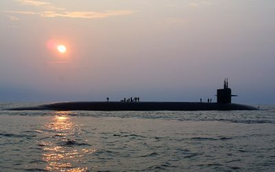 A nuclear-powered ballistic-missile submarine on the surface at sea
