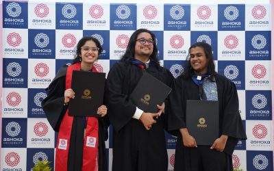 University students in graduation gowns seated at a convocation ceremony
