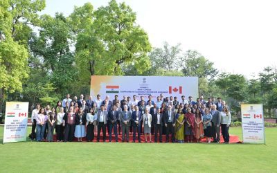 Indian and Canadian delegations in a group photograph at a round of Comprehensive Economic Partnership Agreement negotiations in New Delhi