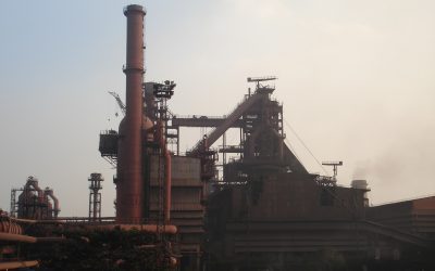 Industrial steel plant with blast furnaces and chimneys