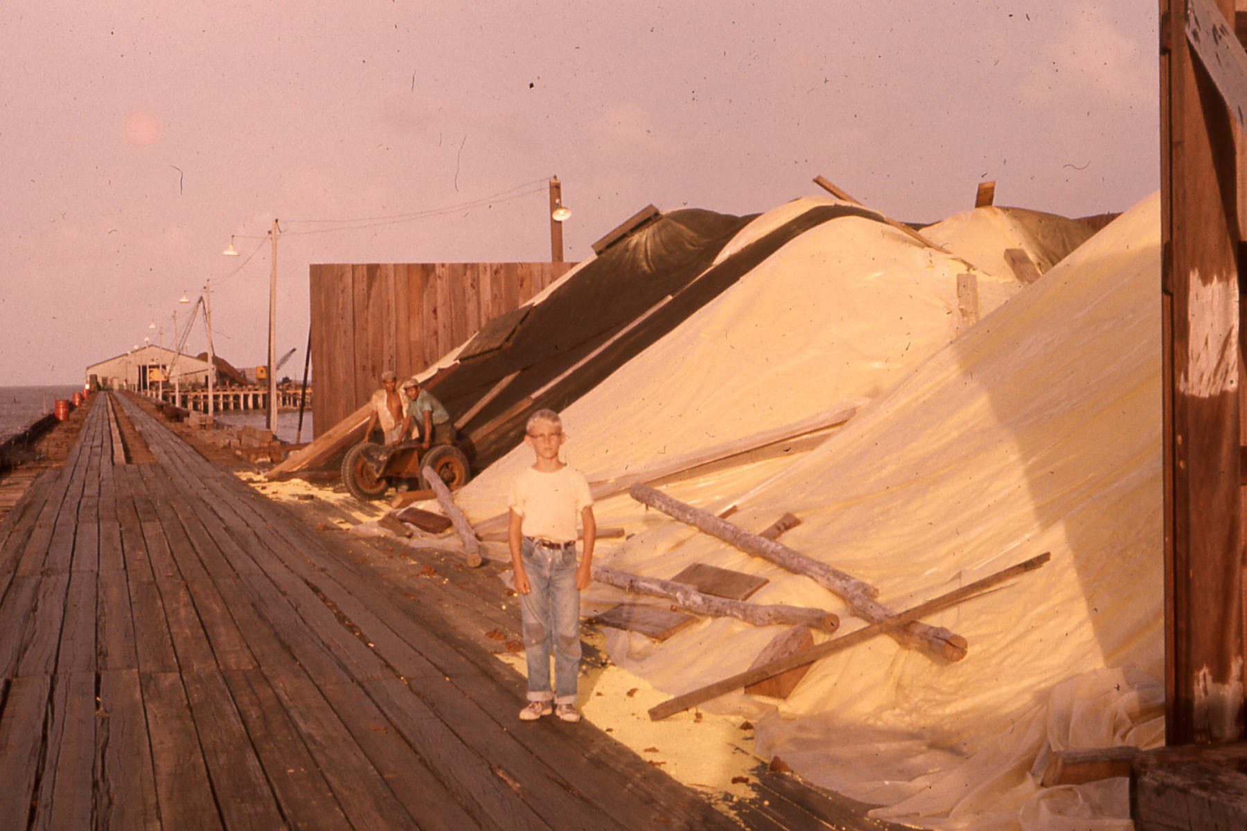Large stockpile of yellow sulphur on a port dock