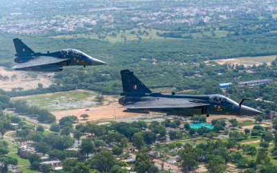 Two IAF Tejas light combat aircraft in flight during Exercise Tarang Shakti 2024
