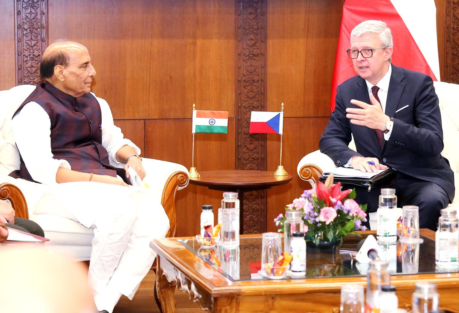 India's Defence Minister and the Czech Republic's First Deputy Prime Minister Karel Havlíček in talks in New Delhi, with Indian and Czech flags on the table