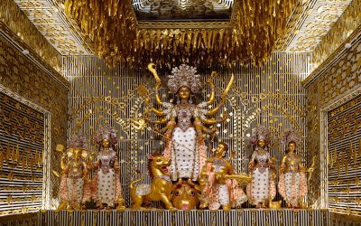 Durga Puja idol of the goddess Durga with her family inside a decorated pandal in Kolkata