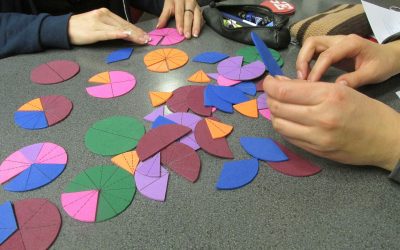Foam paper circles cut into fraction pieces