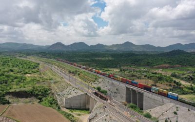 A container freight train running on the Western Dedicated Freight Corridor in India